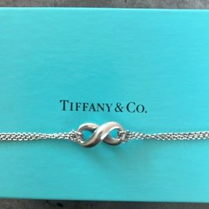 Tiffany and Co infinity necklace.